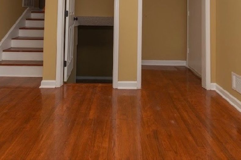 Hardwood flooring installed through an open living area