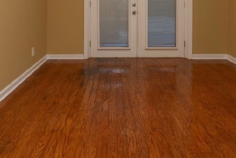 Hardwood floor with white baseboards in a Columbus home
